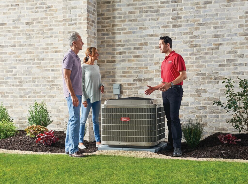 Service 1st Heating and Cooling Bryant Dealer Couple Air Conditioning Unit