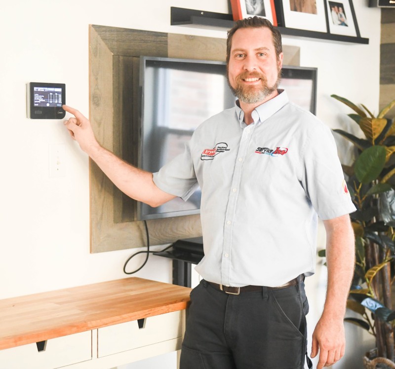 Silas-at-thermostat
