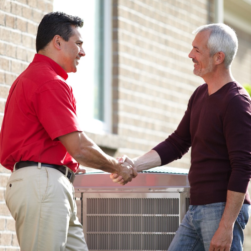 Bryant guy with dealer handshake